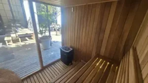 Cozy interior with large window, sauna installation Johannesburg.