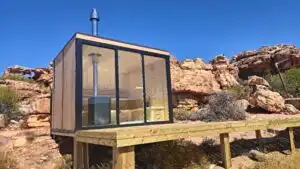 Wooden door entry frame, sauna installation